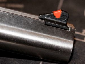 An orange plastic insert on this revolver front sight can make it easier to see.
