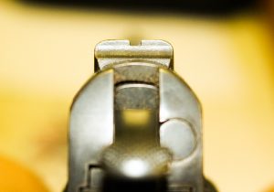 Rear sight of a vintage WWII 1911 pistol.