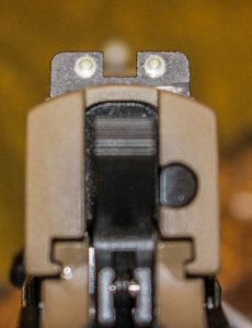 Rear night sight on SIG Sauer P238 pistol.