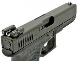 This Glock wears a rear sight that has a laser built-in to it.