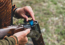 Woman loading Krieghoff 12 gauge Victoria